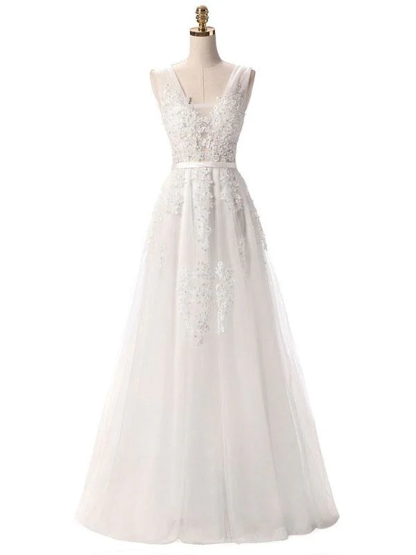 Side profile of an A-line V-neck lace applique dress.