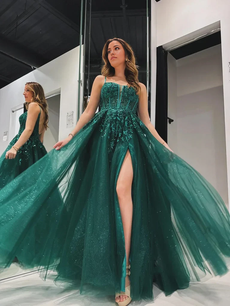 Front view of an elegant A-line V-neck lace prom dress with a high slit.