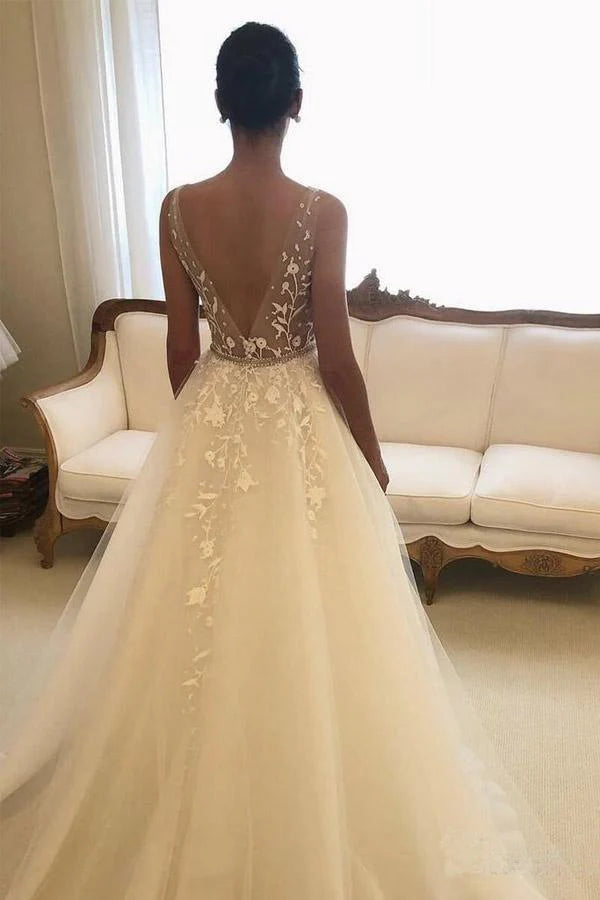 Back view of A-Line V-Neck lace wedding dress with rustic details.