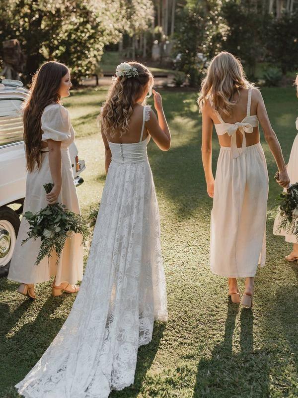 Full length shot of the romantic lace wedding gown.