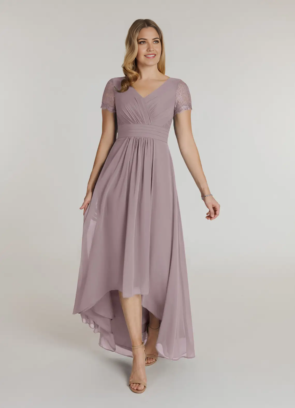 Woman wearing a full-length Dusk A-line V-neck lace chiffon gown.
