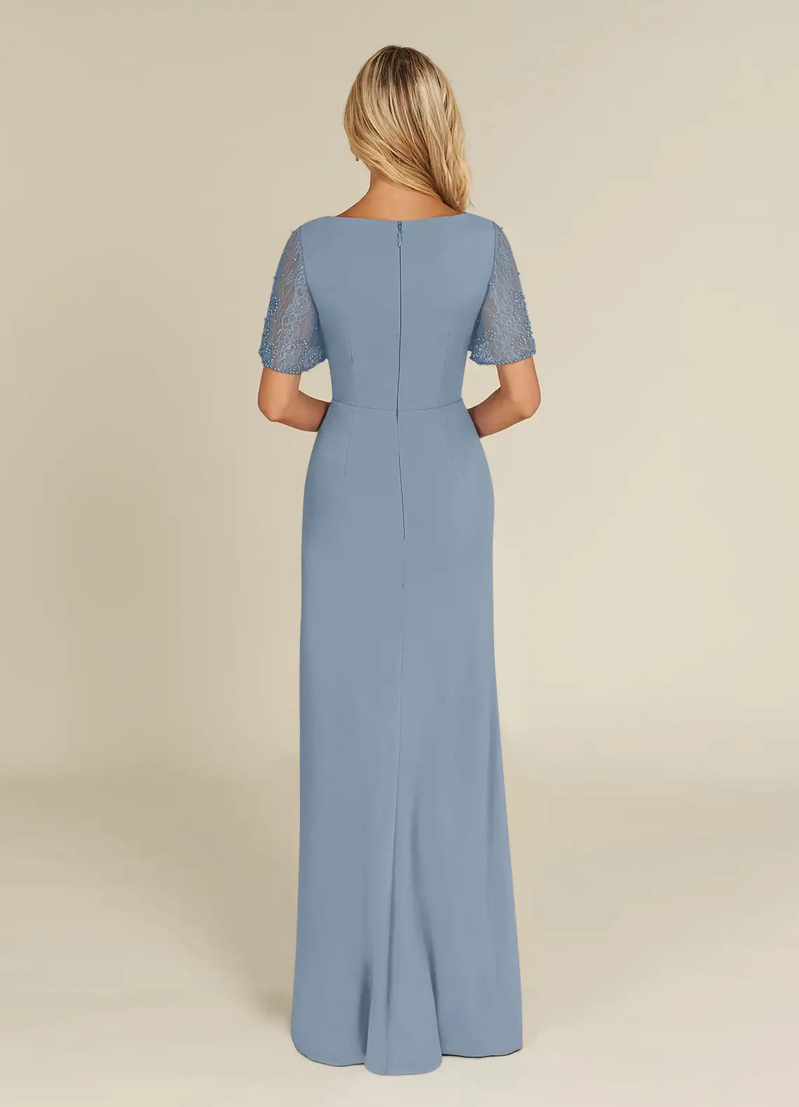 Back view of a woman in a dusty blue A-line formal evening dress.