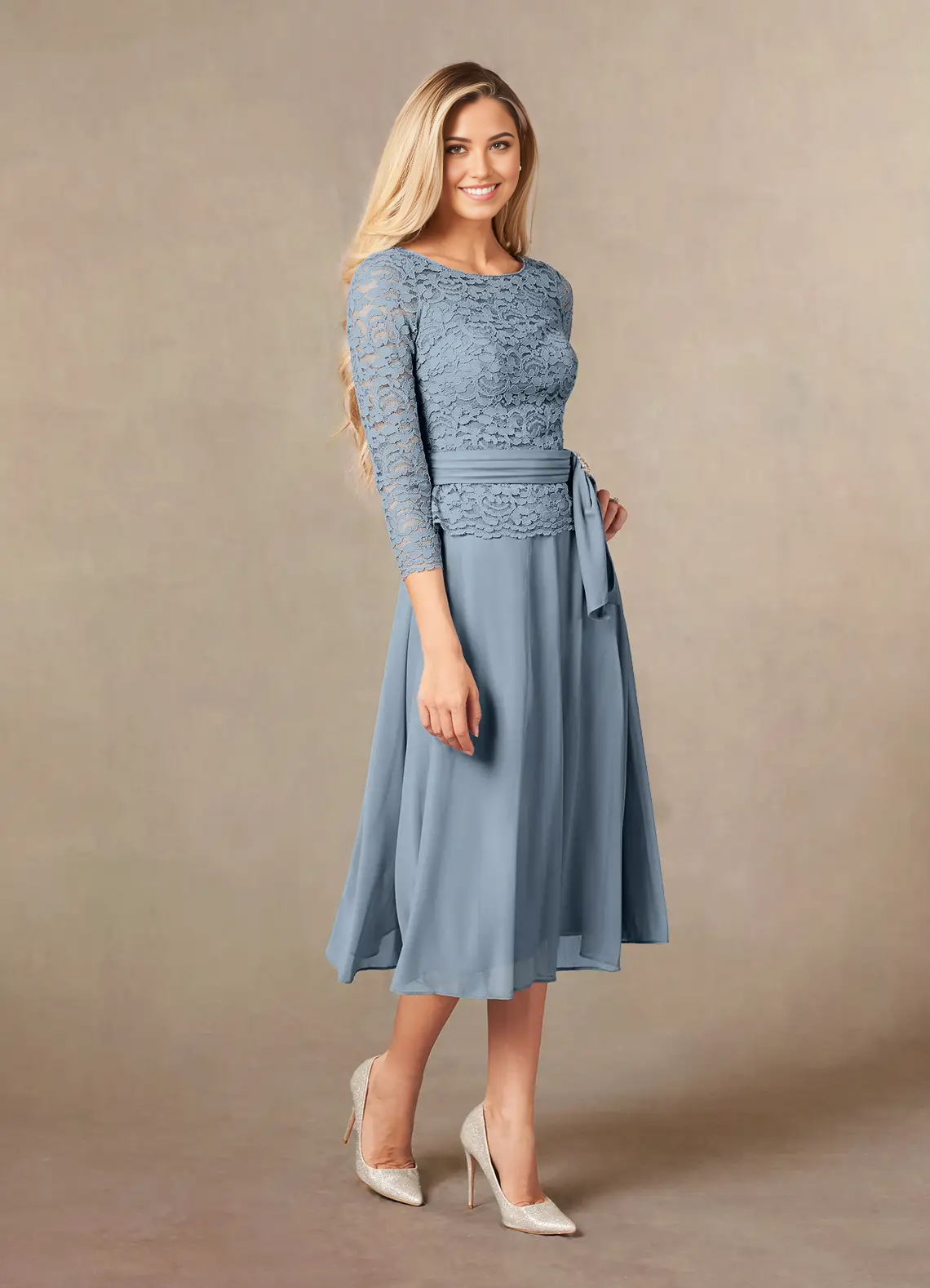 Dusty blue lace fabric detail on an A-line V-neck dress.