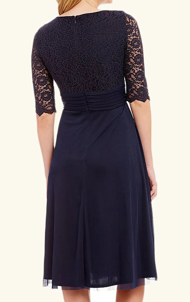 Full view of the knee-length A-line V-neck lace dress with short sleeves, perfect for formal occasions.