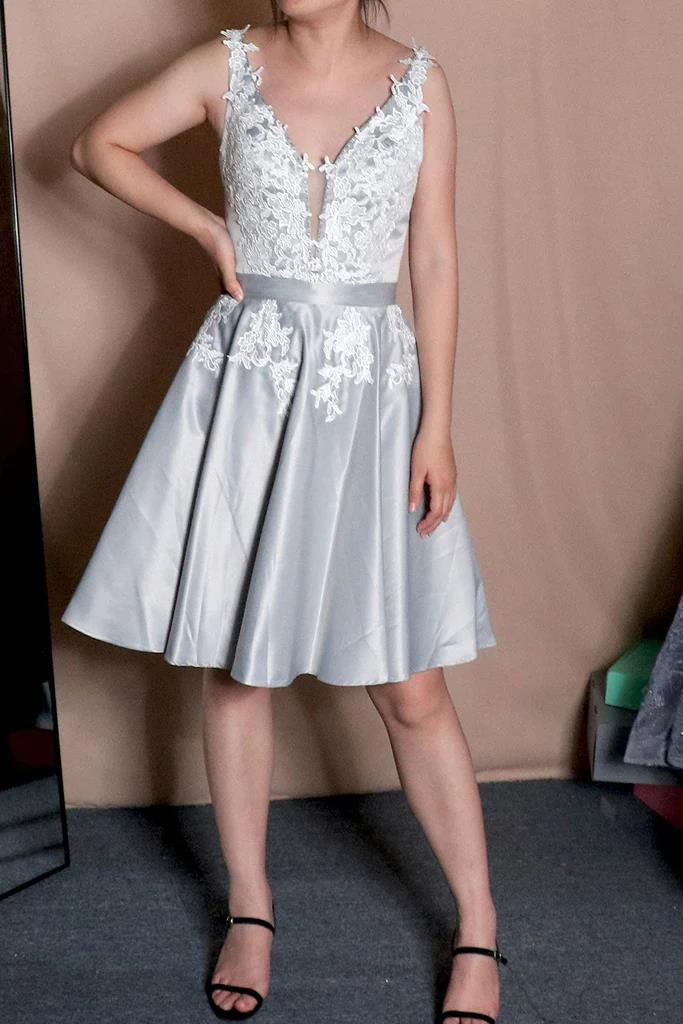 Elegant A-line V-neck lace short homecoming dress with an open back.