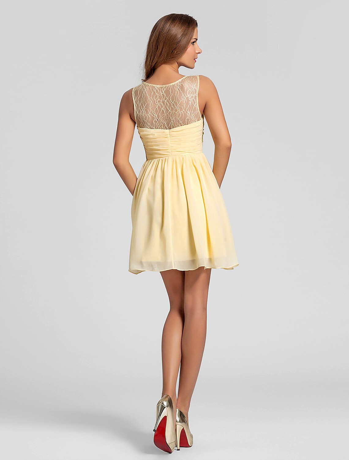 Back view of A-line V-neck chiffon bridesmaid dress with criss-cross detail.