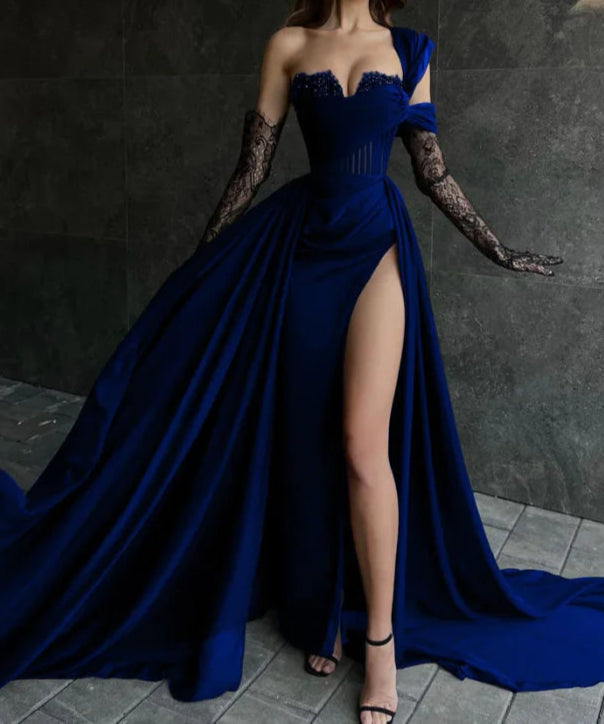 Prom dress with lace sleeves and a V-neck, styled for a formal event.