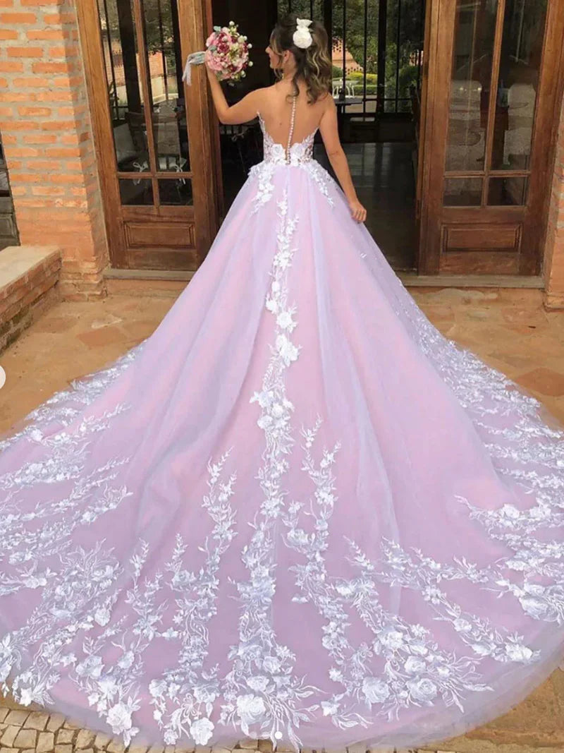 Back view of an A-line V-neck lace wedding dress with delicate lace details.
