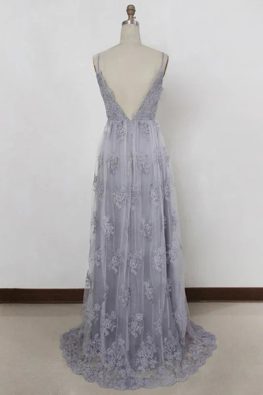 Back view of the A-line formal gown, showcasing lace details and flowing skirt.