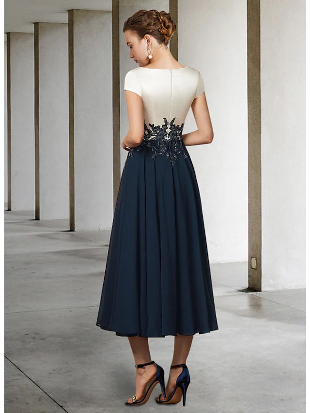 Side view of short sleeve mother of the bride gown.