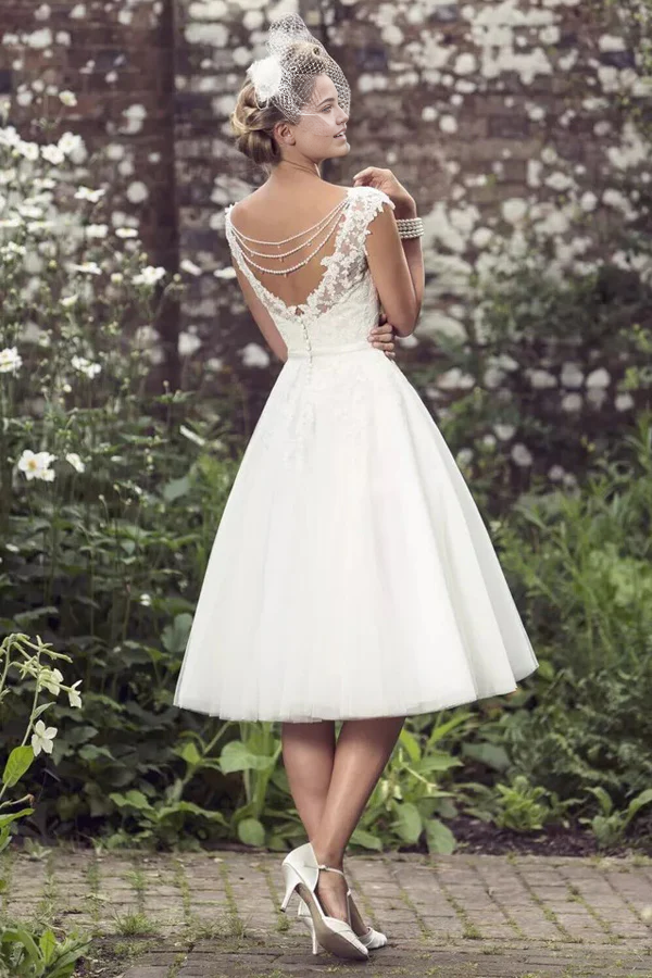 Back view of an A-line lace bridal gown.