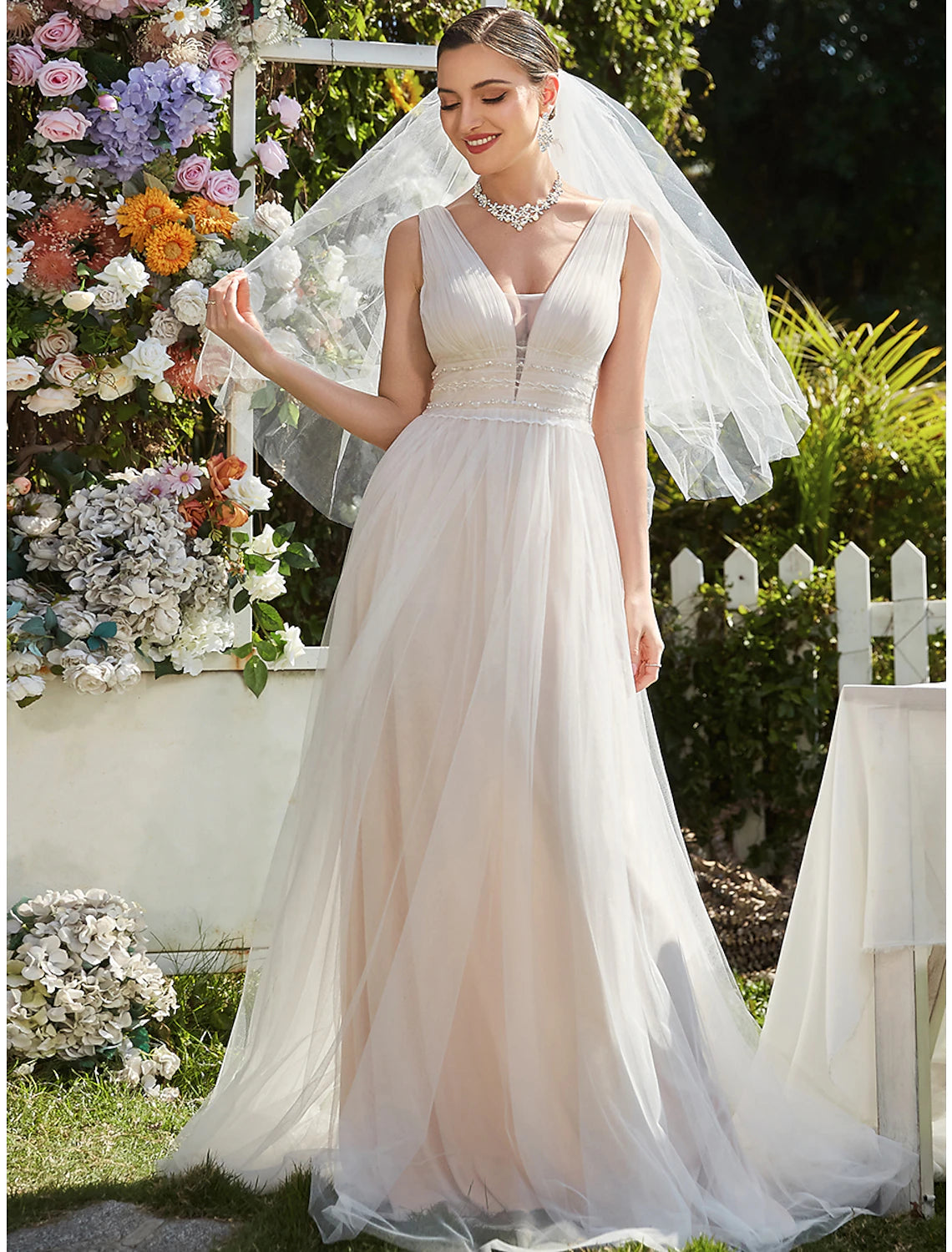 Side view of A-Line V-neck lace tulle beach wedding dress.