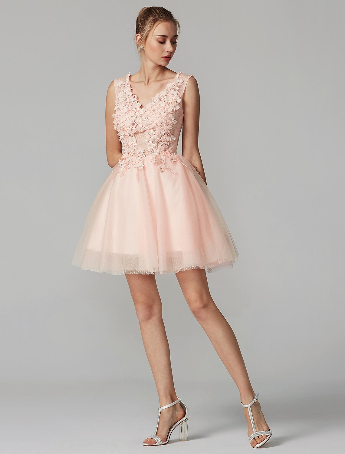 Back view of A-line mini dress featuring tulle skirt.