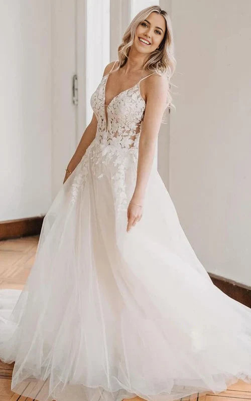 Elegant A-Line V-neck wedding dress with lace and tulle, featuring spaghetti straps.