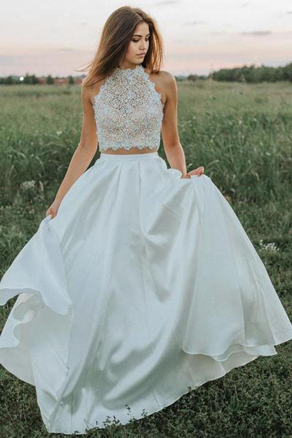 Elegant two-piece A-line white lace wedding dress with V-neck and pockets.