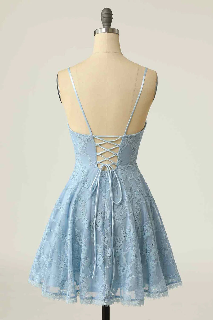 Back view of the A-line V-neck lace dress showing the lace-up detail.