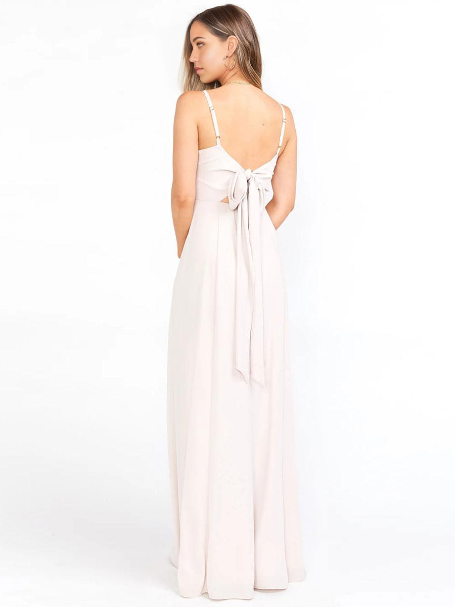 Back view of A-line formal dress showing lace-up detail.