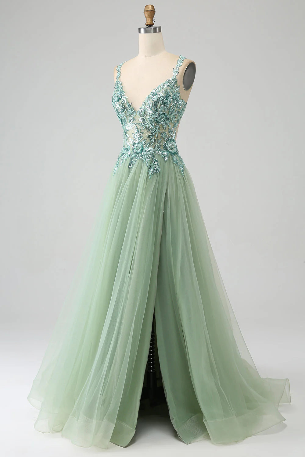 Back view of an elegant light green A-line V-neck long prom dress with delicate appliques.