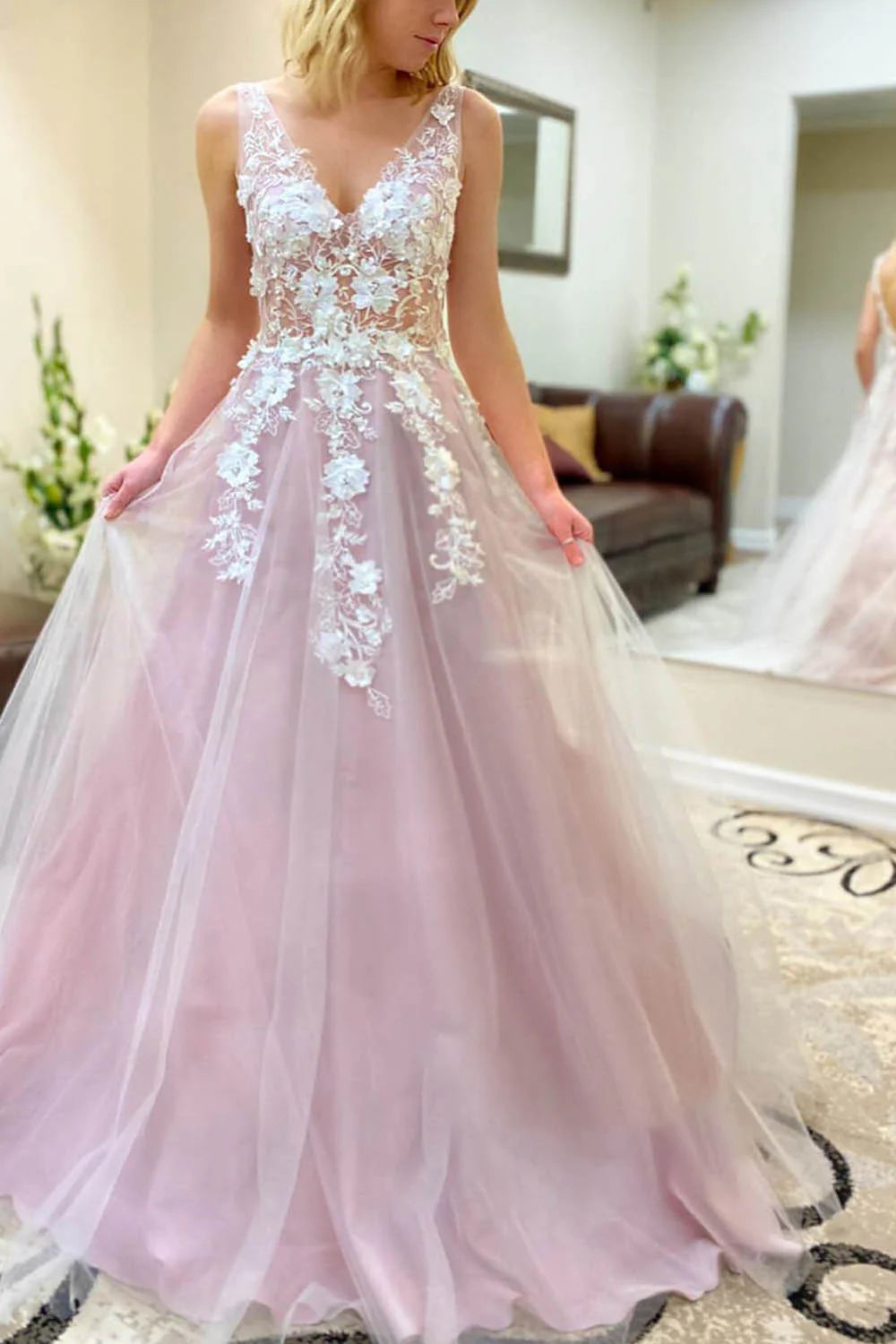 Back view of the A-line V-neck long prom dress, showcasing the flowing skirt and appliques.