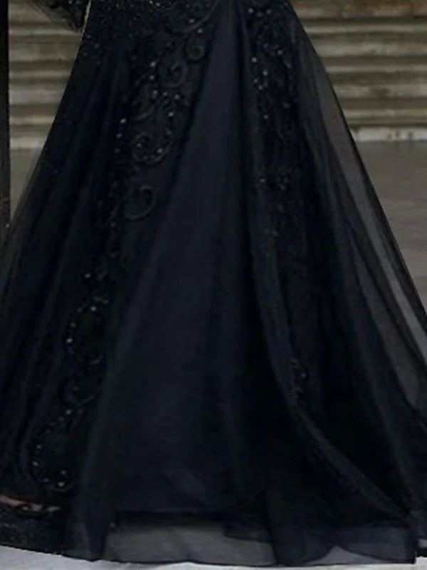 Side view of the A-line V-neck long sleeve evening gown.