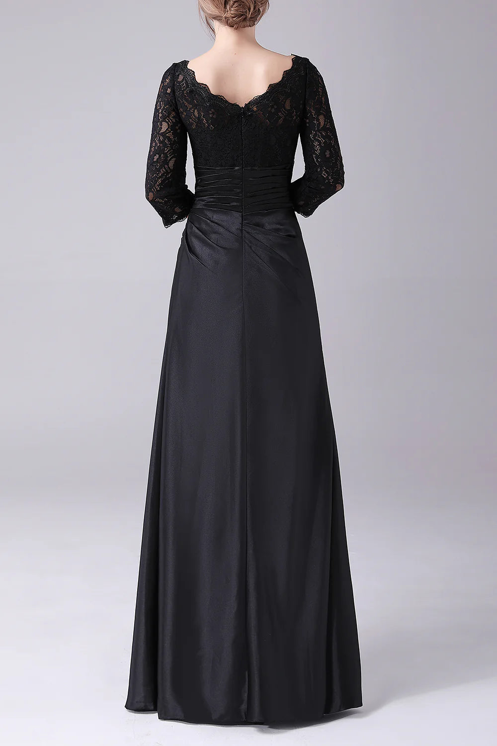 Back view of the black A-line V-neck long sleeve dress.