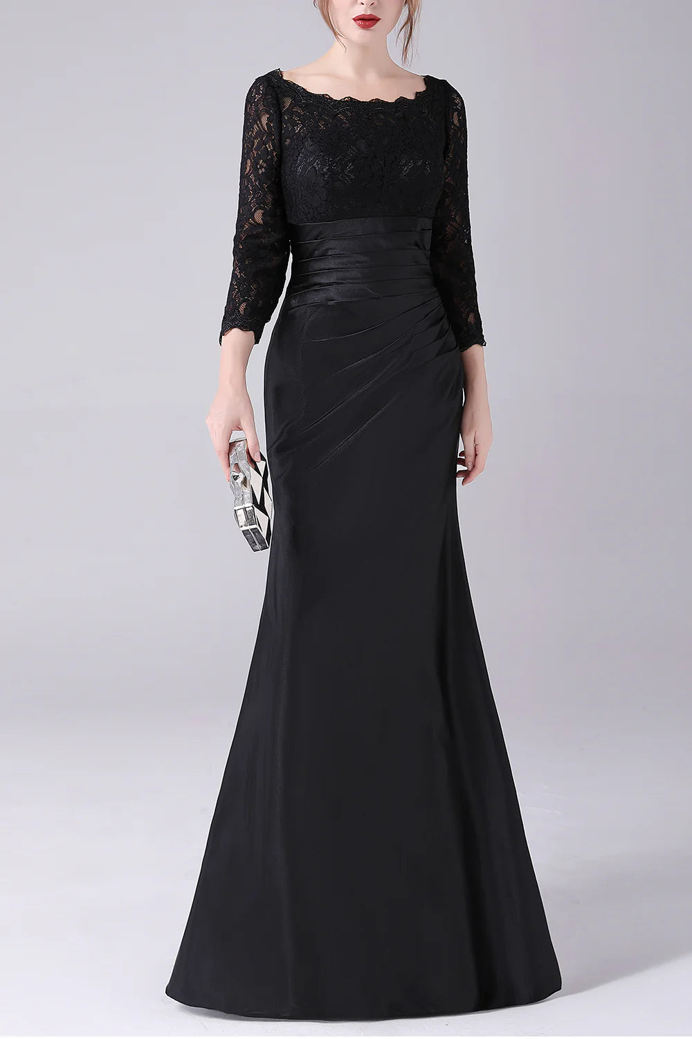 Side view of the black A-line V-neck long sleeve dress.