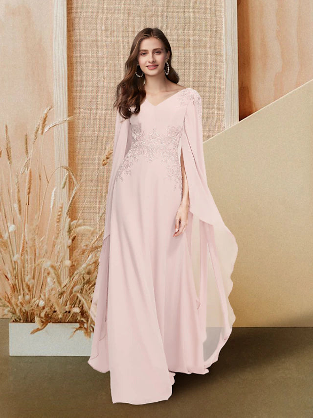 Floor-length formal evening gown with delicate appliques.