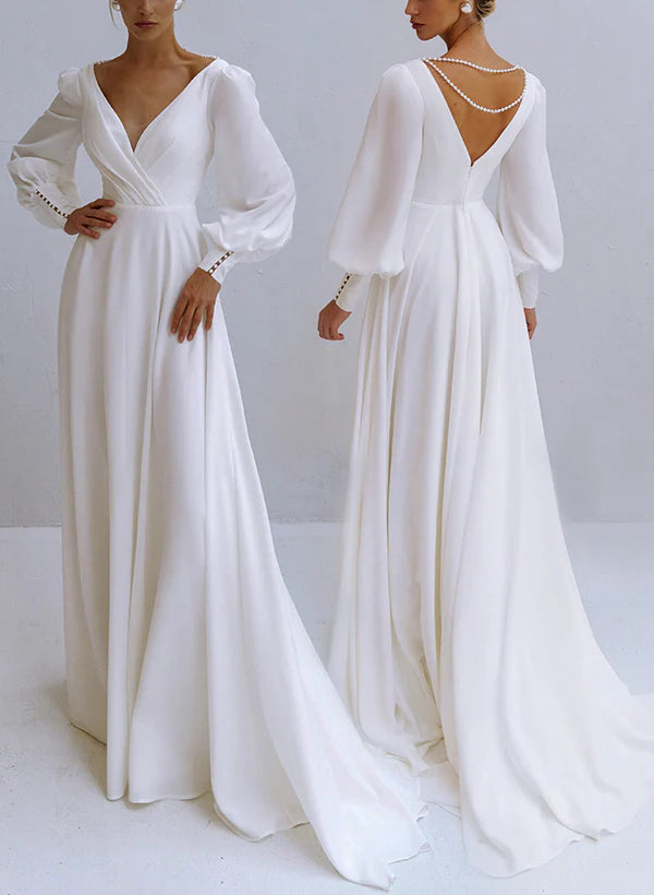 Elegant A-line V-neck long sleeve chiffon wedding dress with intricate beading.