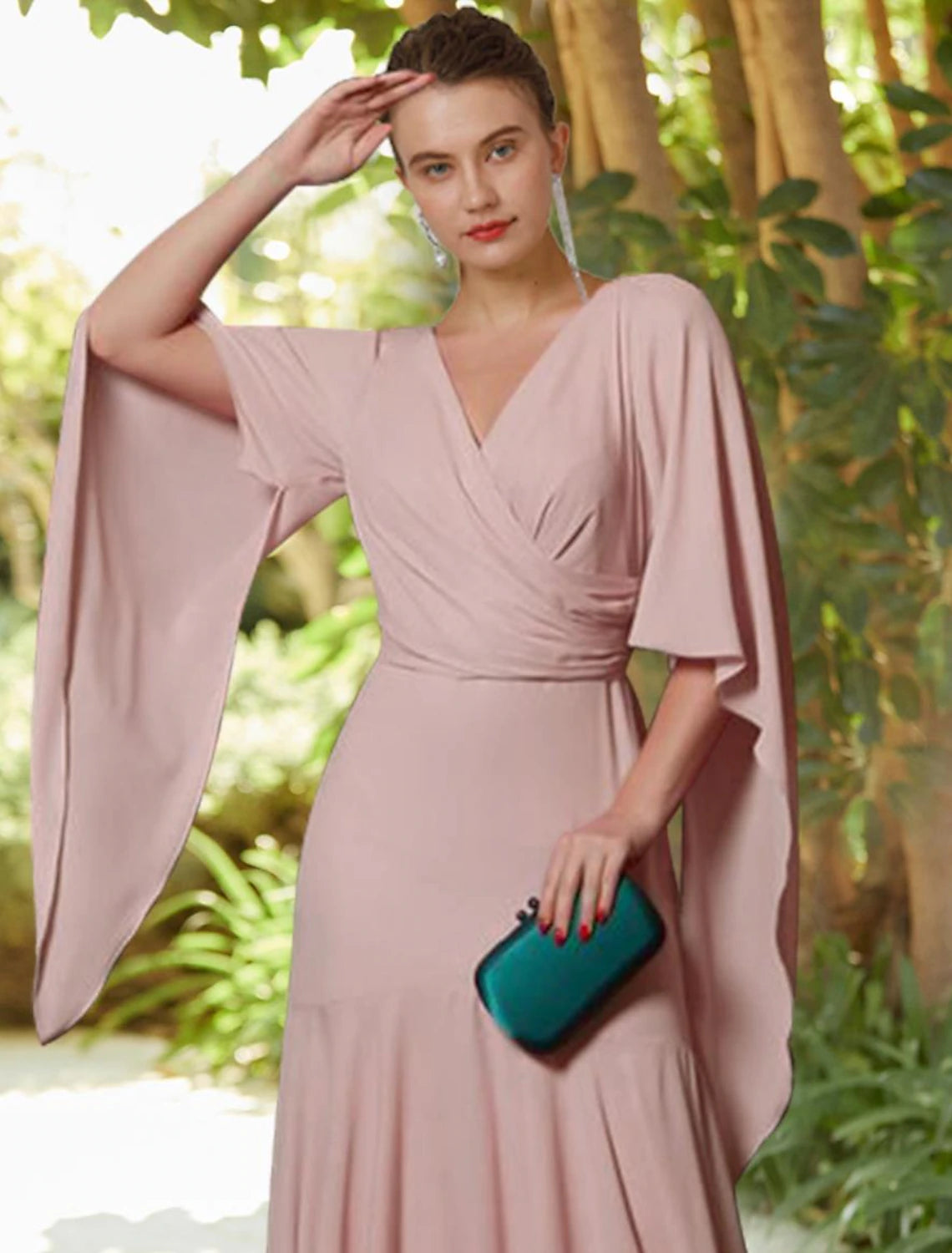 A-line V-neck long sleeve chiffon formal gown with pleats, side view.