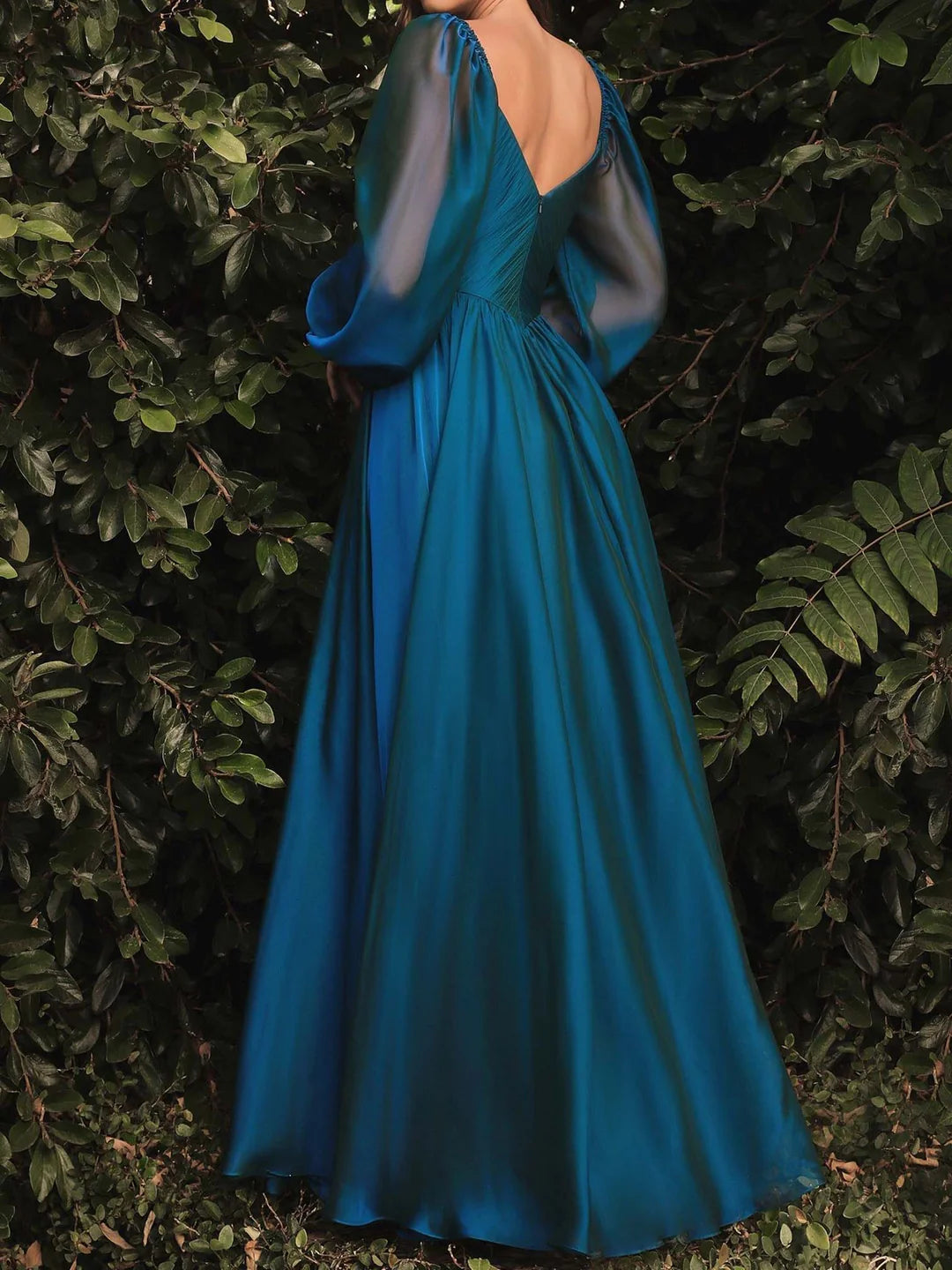 Full view of the formal A-line V-neck gown with long sleeves.