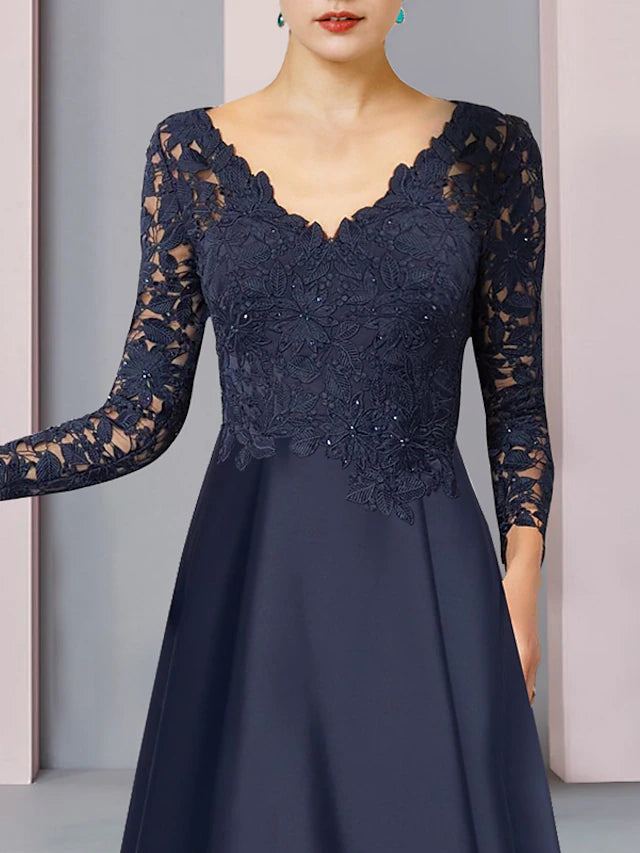 Side view of the formal dress highlighting satin fabric and pleats.