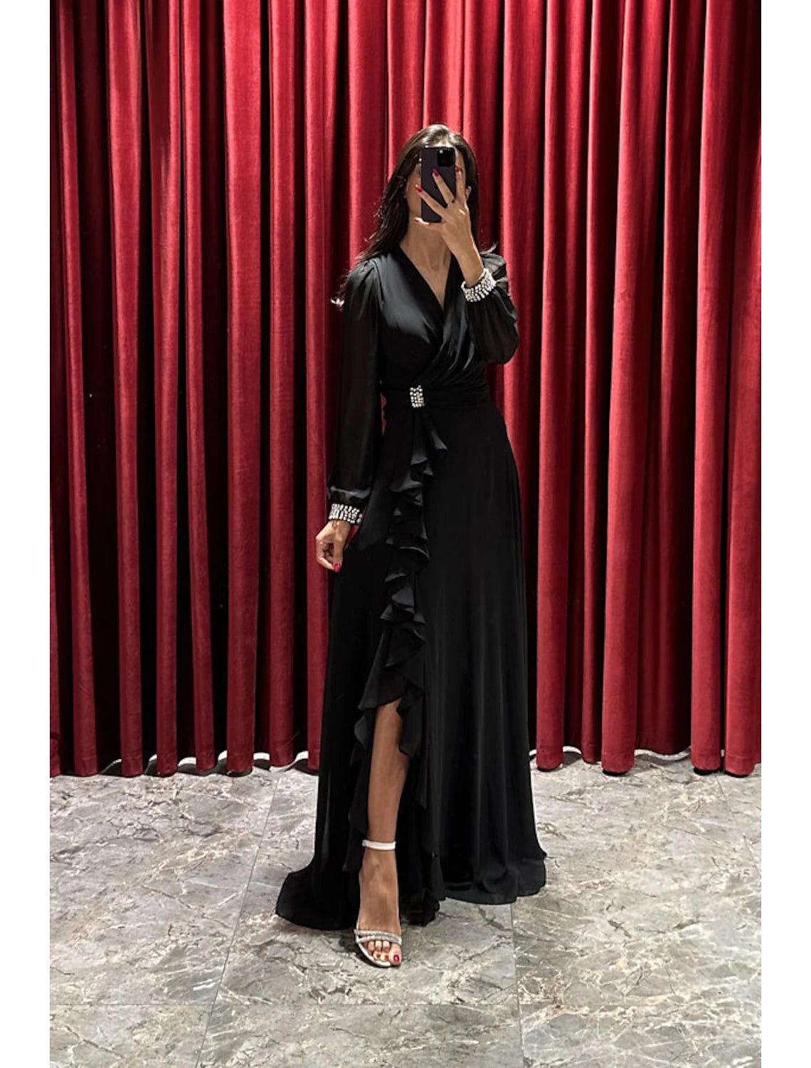 Side view of the formal A-line dress, highlighting the high split detail.