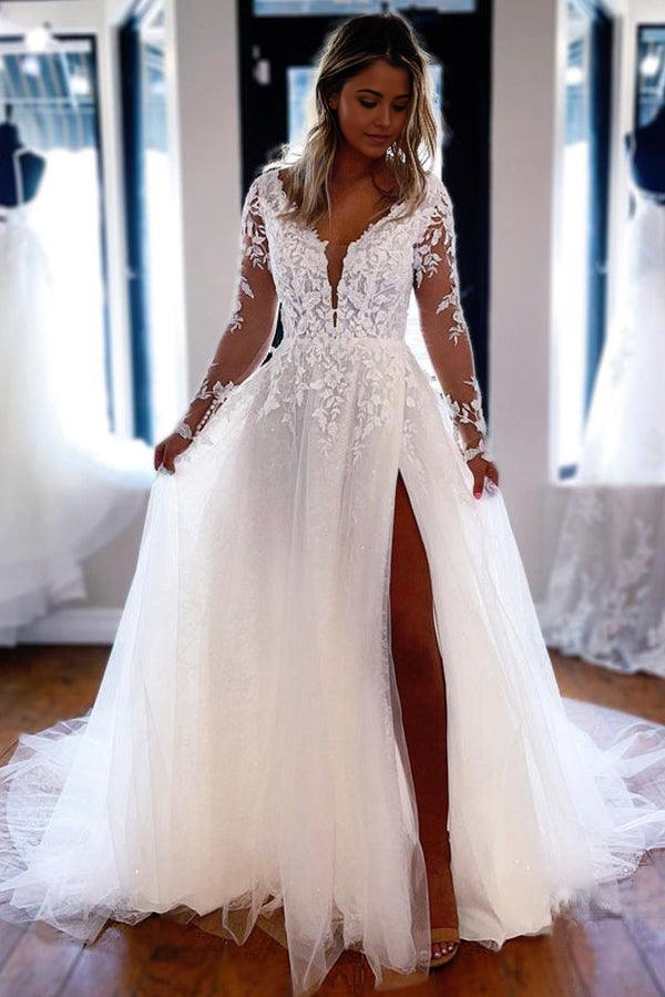 Elegant A-line V-neck lace wedding dress with long sleeves.