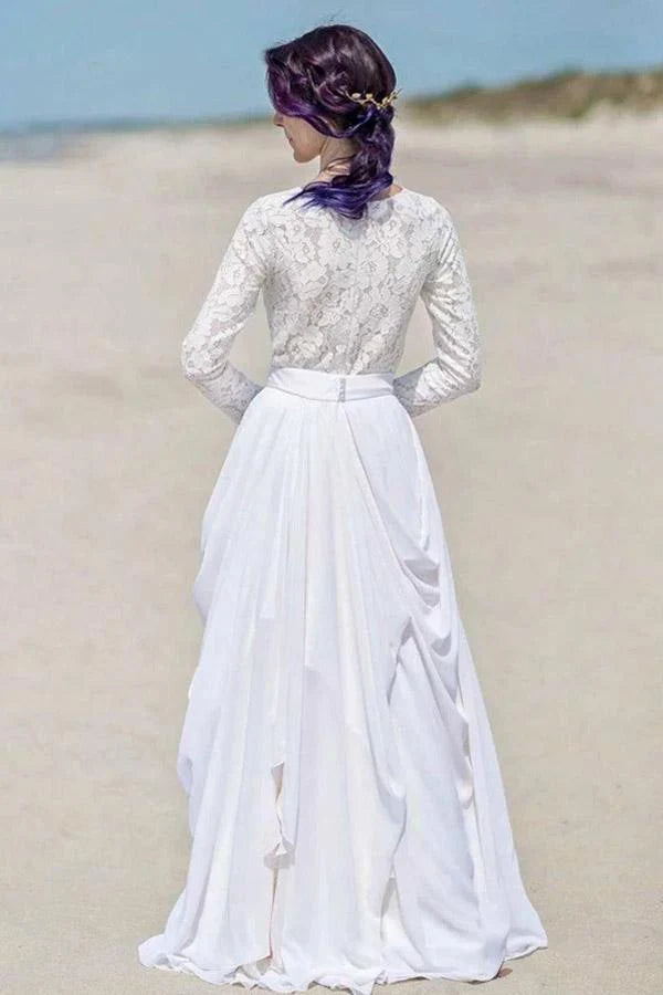 Back view of a white lace and chiffon wedding dress with a zipper closure.