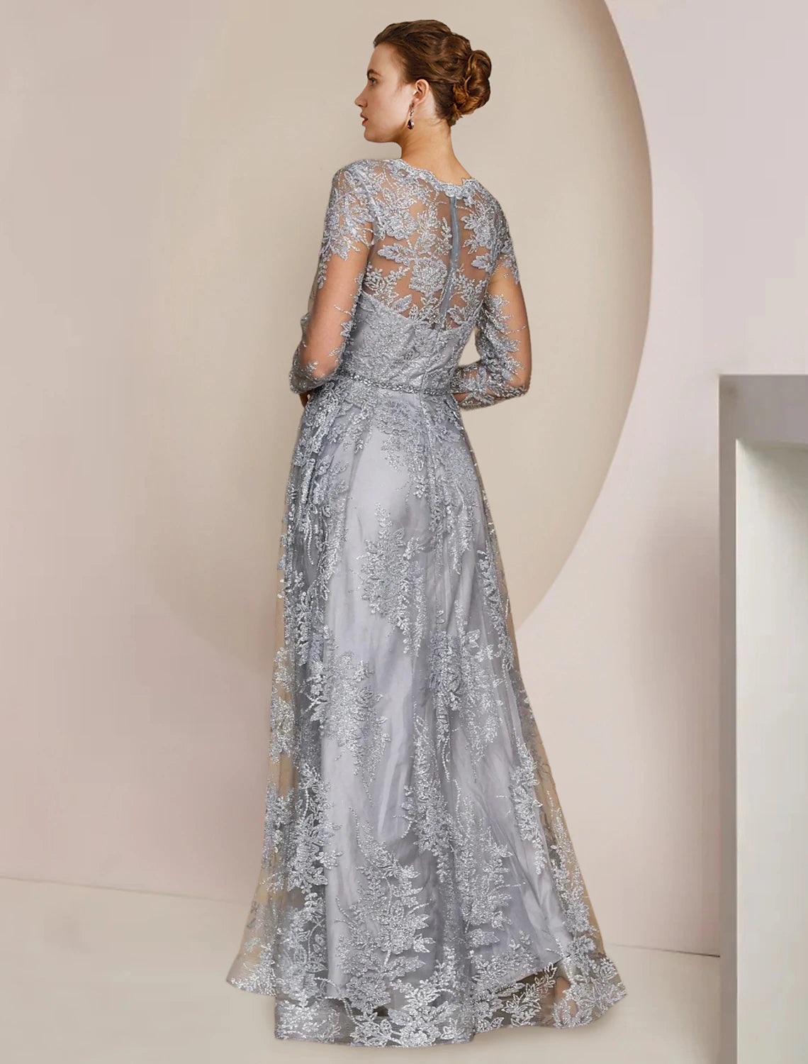 Back view of the A-Line Mother of the Bride dress, showing lace details and elegant silhouette.