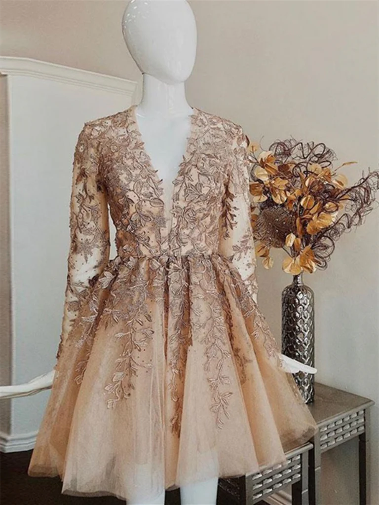 Elegant short lace dress with V-neck and long sleeves.