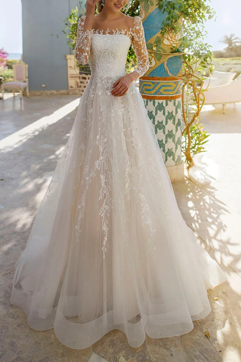 Close-up of intricate lace detailing on the A-line V-neck wedding dress.