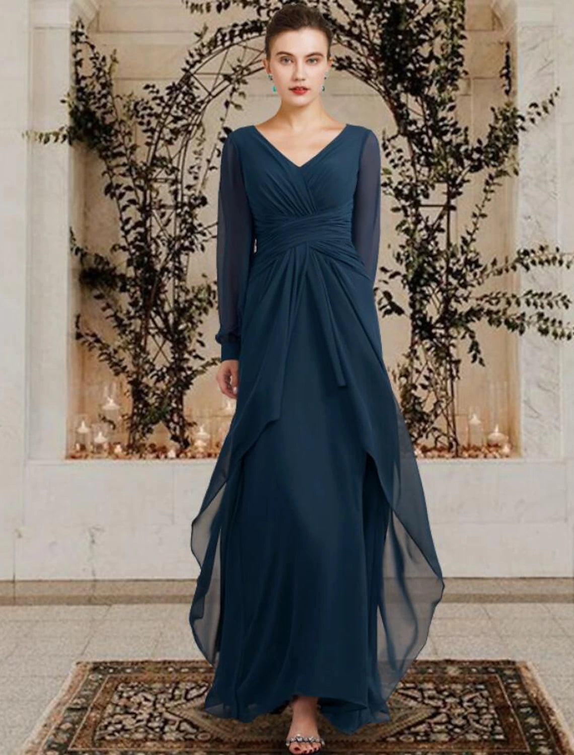 Full length view of a woman wearing a side-draped Mother of the Bride dress.