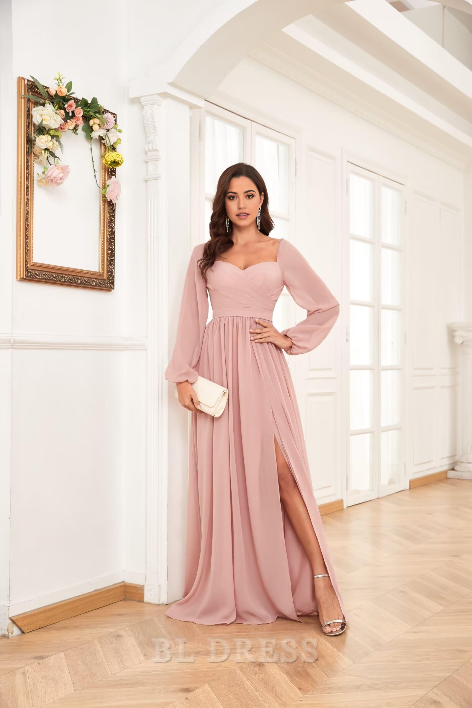 Model wearing an elegant A-line V-neck long sleeve pleated chiffon formal dress with a high slit.