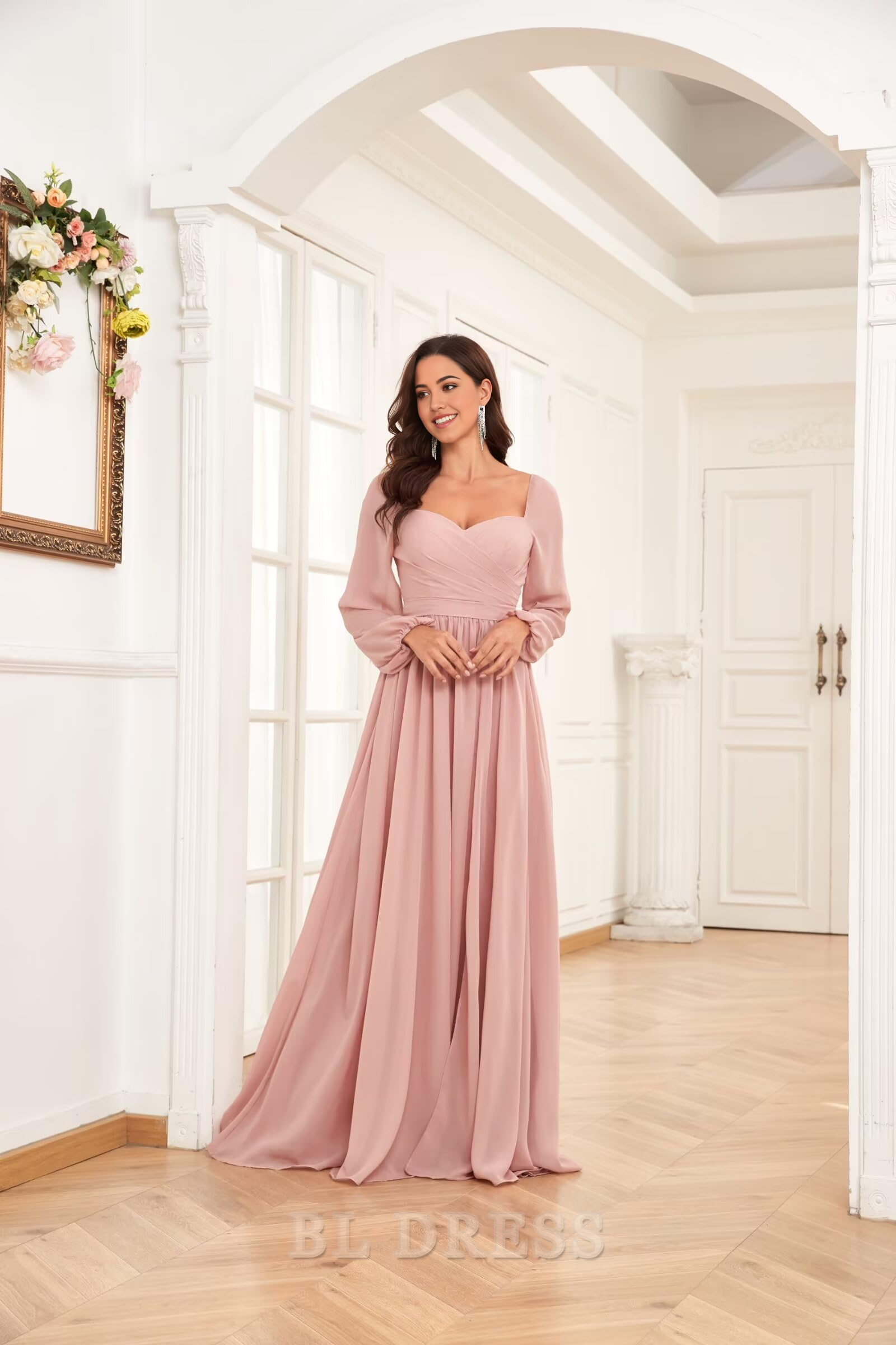 Side view of a model in an A-line long sleeve dress, highlighting the V-neckline and slit.