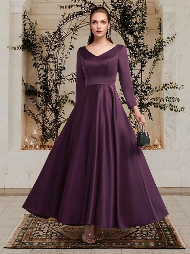 Model wearing an elegant A-line V-neck long sleeve satin dress.