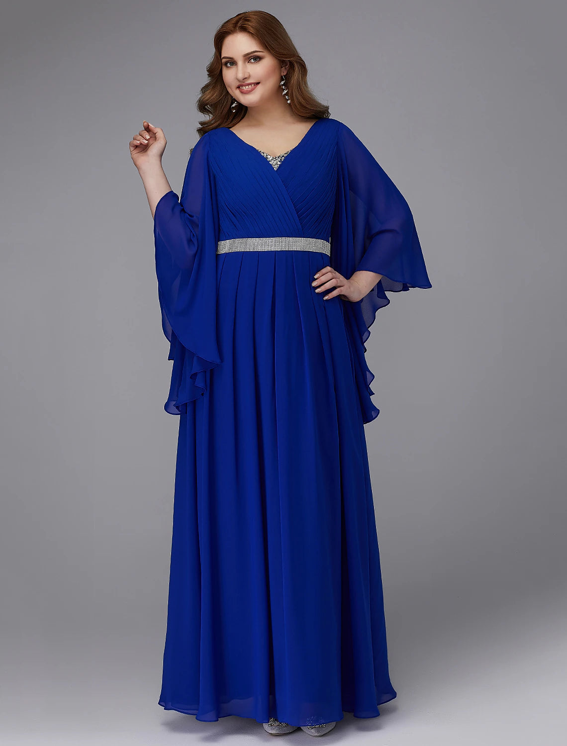 Side view of the plus size A-line dress, highlighting its graceful floor-length silhouette.