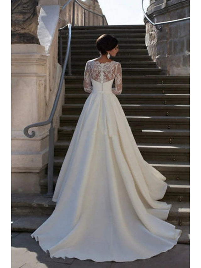 Back view of the A-line satin wedding dress, showcasing the court train and delicate appliques.