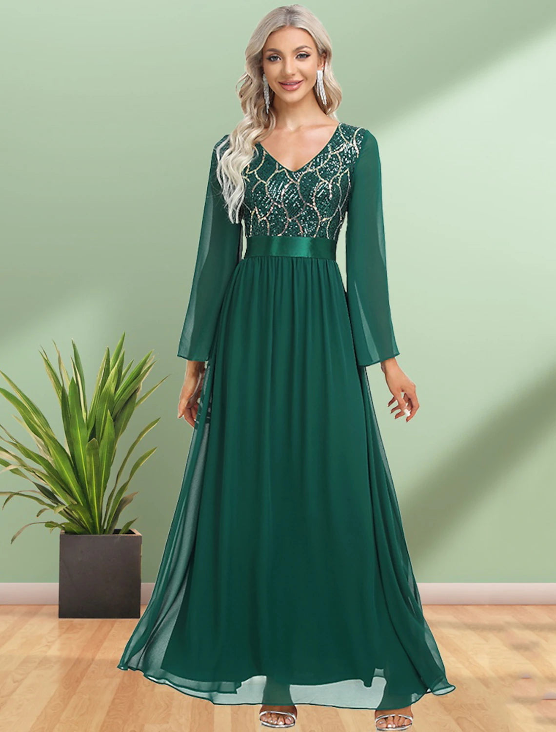 Elegant A-line evening gown with V-neck and long sleeves, featuring sequin embellishments on chiffon fabric.