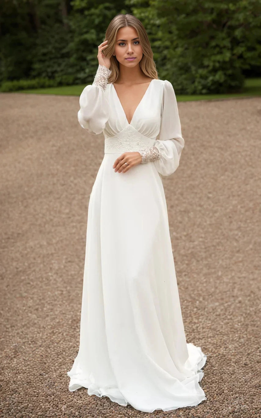 Model wearing an elegant A-line chiffon wedding dress with long sleeves and sequins.