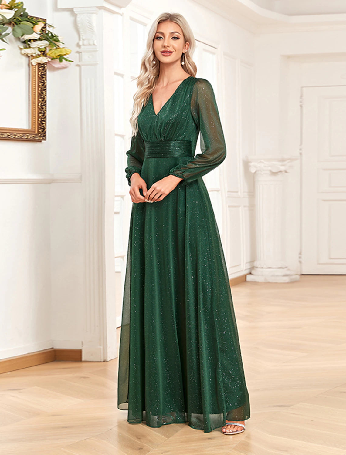 Close-up of the sequin embellishments on the V-neck gown.
