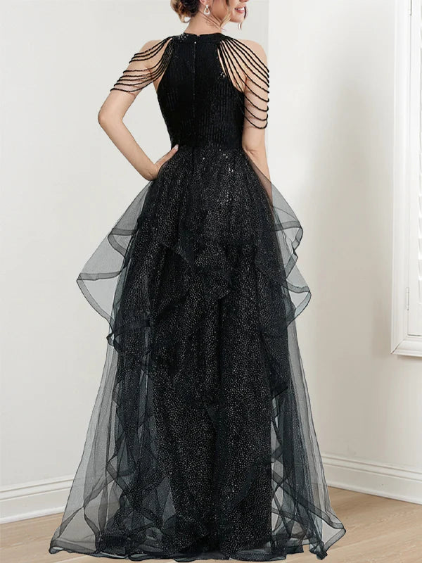 Side view of the shimmering A-line sequin maxi dress.