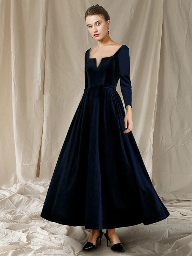 Elegant A-line velvet dress with V-neck and long sleeves, featuring pleats, suitable for formal events.