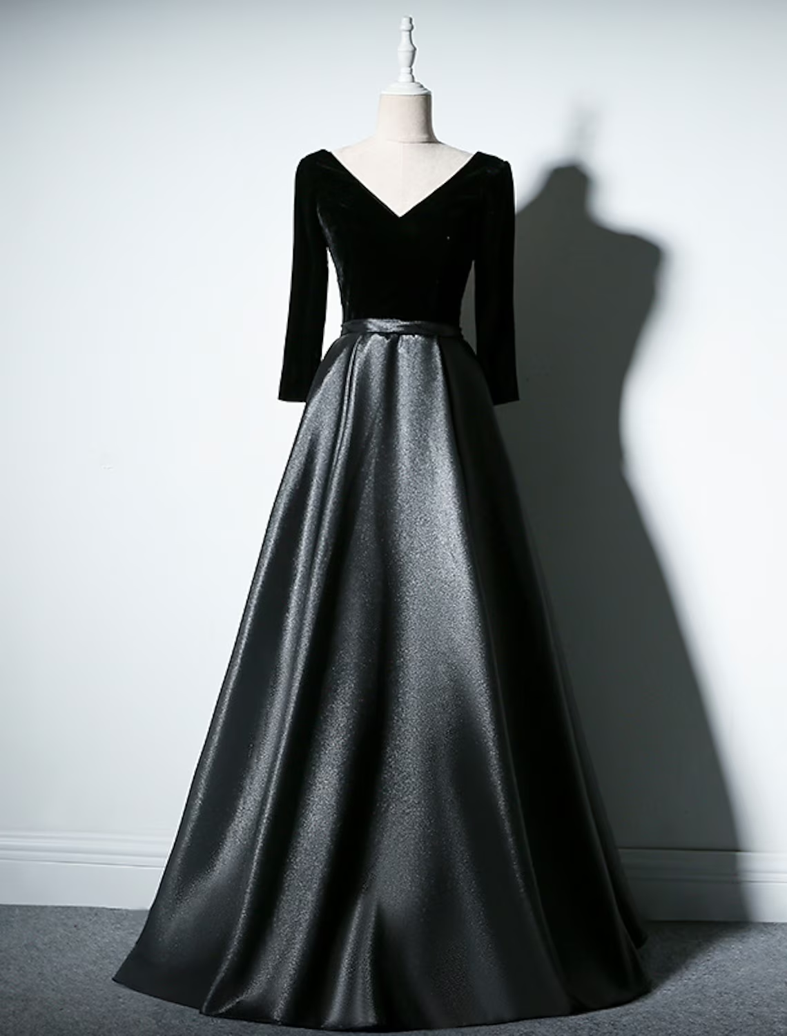 Back view of the floor-length Mother of the Bride dress with pleats.