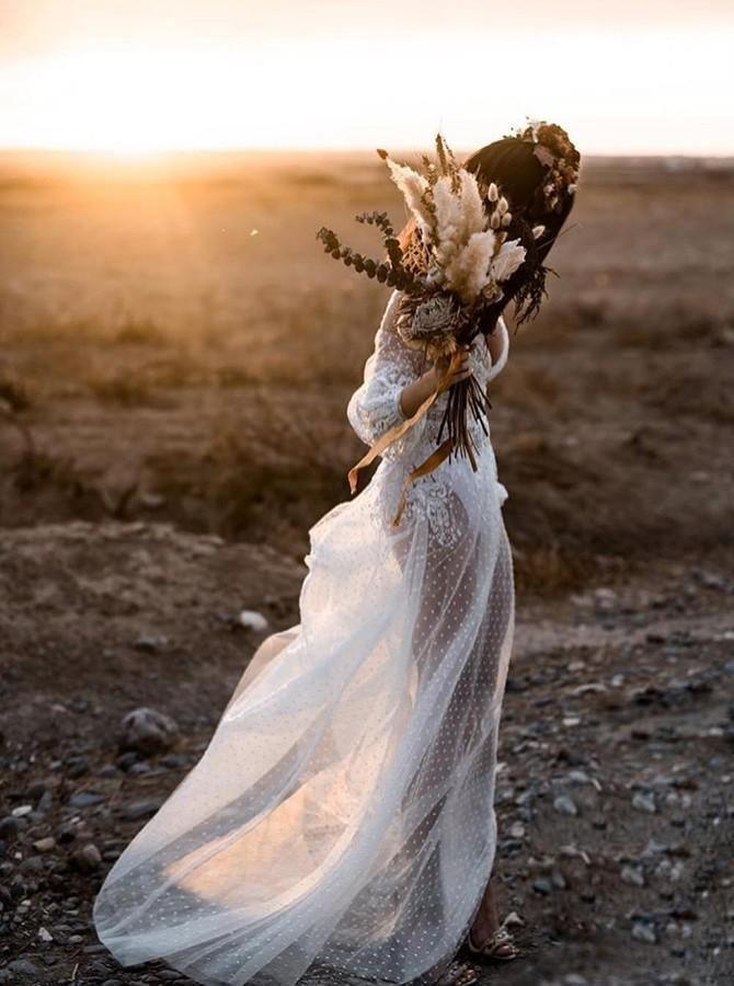 Back view of A-Line wedding dress with delicate appliques.